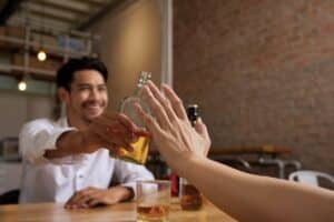 Can I still drink socially after rehab?